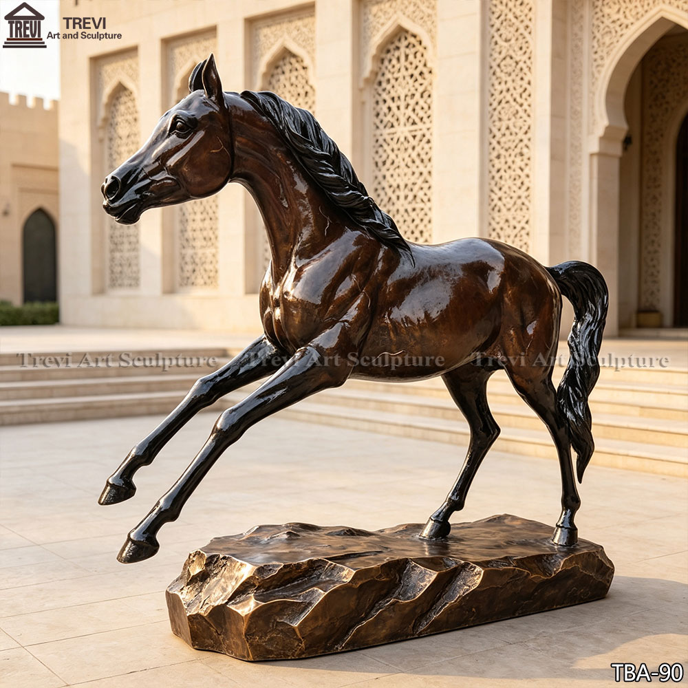 Bronze galloping Arabian horse statue with dynamic forward motion, suitable for a corporate lobby